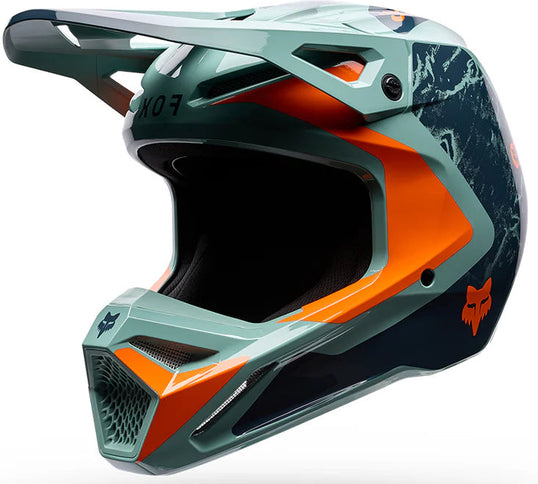FOX V1 Image Print MX helmet in ARC Blue with bold graphic design, lightweight construction, and adjustable strap for motocross riding.