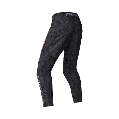 Black MX pants called 180 Abyss Pant from FOX, featuring a sleek design with durable fabric and adjustable waistband.