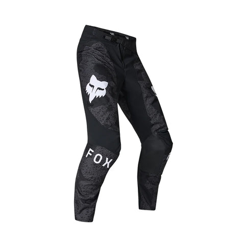 FOX 180 BNKR MX Pants in black camouflage, showing the durable fabric, knee protection, and stylish design for motocross riding.