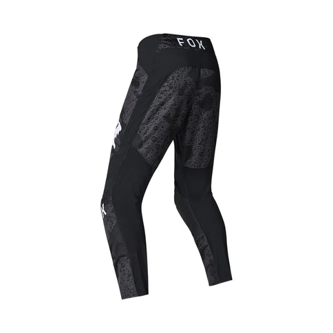 Fox 180 BNKR MX Pants in black camouflage, showcasing durable motocross pants with reinforced knees and adjustable waistband.