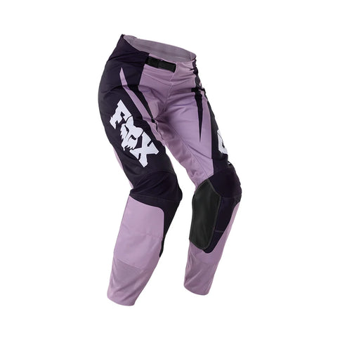Fox 180 RAID women's MX pants in lavender drift color, featuring durable motocross gear design and padded knee protection.