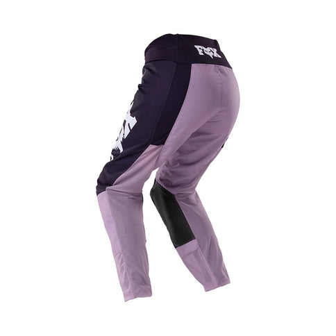 FOX 180 RAID women's MX pants in lavender drift, showcasing durable riding gear with reinforced knees and adjustable waist.