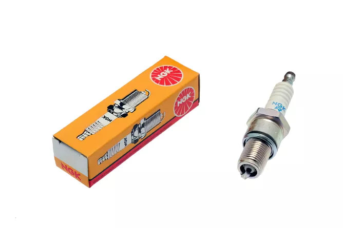 NGK B5ES spark plug showing metal terminal, ceramic insulator, and threaded metal shell for automotive ignition systems.