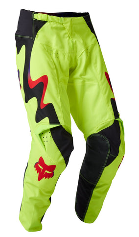 FOX 180 Kozmik Flo Yellow MX pants with reinforced knee panels and durable fabric, designed for motocross riding.
