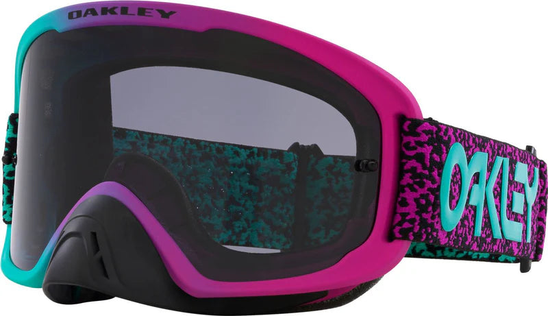 Oakley O-Frame Pro 2.0 MX goggles with Celeste/Purple Viper Room design and dark lens for motocross riding.