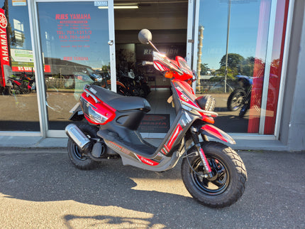 Used 2005 Yamaha BWS 100 scooter with black and silver body, displayed with side view and clear branding.