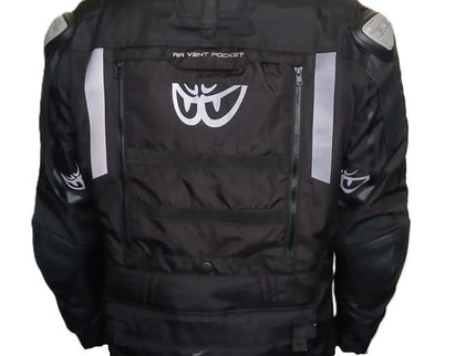 Black and grey BERIK nylon adventure jacket displayed on a hanger with a focus on the front design and material details.