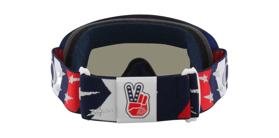 Oakley O Frame MX goggles with RWB Stars design and dark gray lenses, featuring a durable frame and adjustable strap for motocross riding.