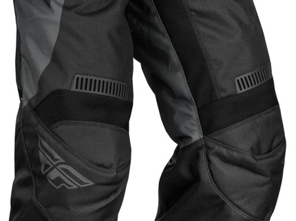 Fly F-16 MX Pants in black and charcoal, lightweight motocross riding pants with reinforced knee panels and adjustable waist.