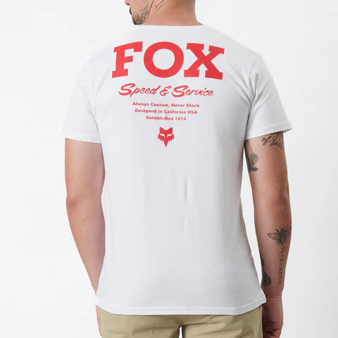 White FOX Speed and Service Tee featuring a graphic design, casual fit, and short sleeves.