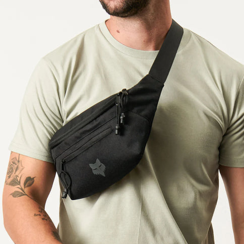 Black FOX main hip pack with adjustable strap and FOX logo, designed for convenient carrying during outdoor activities.