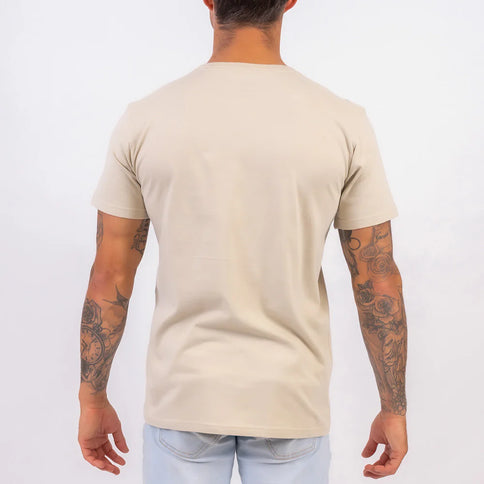 Tan FOX Winged Tee featuring a relaxed fit with wing graphic design, made by FOX for casual, stylish wear.