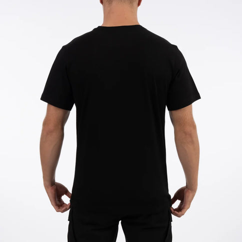 Black Kawasaki Vertical Fox Tee by FOX featuring a bold vertical FOX logo design on a comfortable t-shirt.