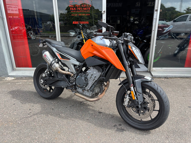 Used 2019 KTM 790 Duke R motorcycle, showing the sporty red and black design with aggressive riding stance and modern details.