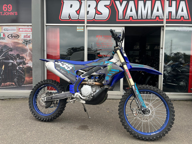 Used 2024 Yamaha YZ 450 FX dirt bike in black and yellow with knobby tires and motocross styling.