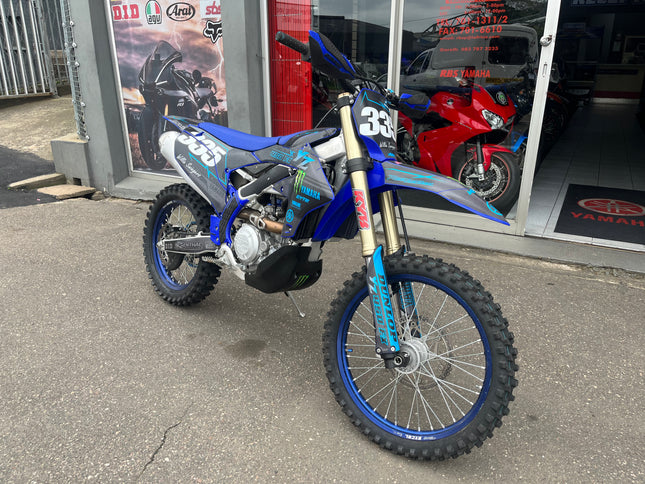 Used 2024 Yamaha YZ 450 FX dirt bike, showing the blue Yamaha motorcycle with off-road tires and rugged build.