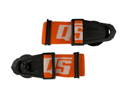 Orange Quick Strap goggles mount accessory attached to a pair of goggles, designed for secure and adjustable fit.