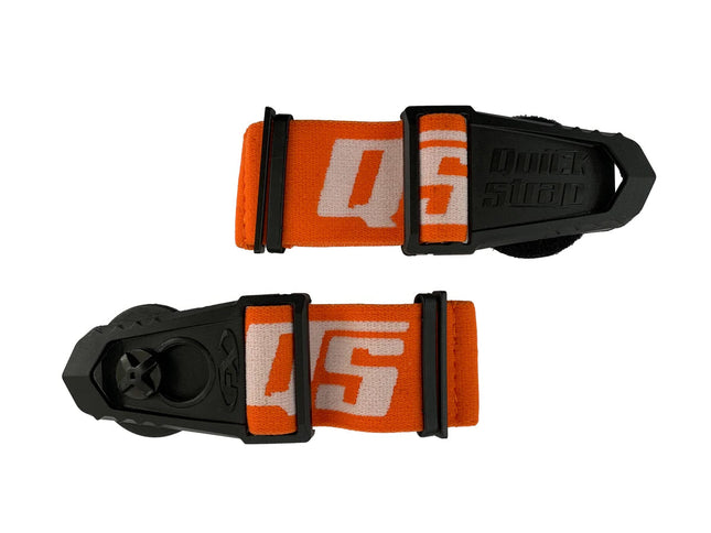 Orange Quick Strap goggles mount accessory attached to a pair of goggles, designed for secure and adjustable fit.