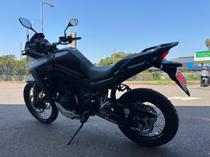 Used 2026 Honda Transalp 750 E clutch demo motorcycle, showing the bike's clutch and side view in good condition.