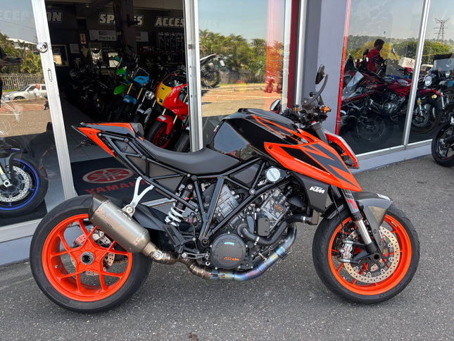 Used Yamaha motorcycle, 2019 KTM 1290 Superduke model, with sporty design and black and orange color scheme.