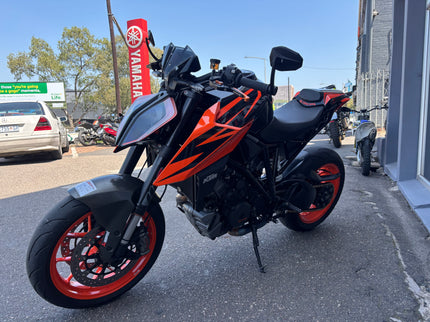 Used Yamaha motorcycle, 2019 KTM 1290 Superduke model, black and silver design, with aggressive sporty stance and detailed engine features.