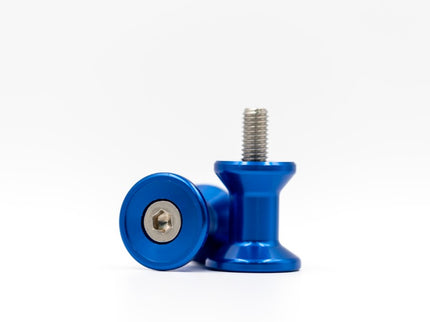 Blue 10mm stand bobbins from RNG, showing a close-up of the small plastic spools used for sewing or crafting projects.