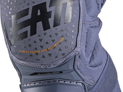 Leatt 3DF Hybrid Flint knee guard showing a durable black knee protector with adjustable straps for sports and outdoor activities.