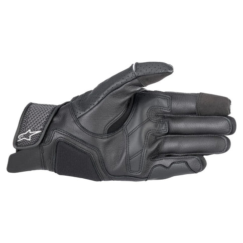 Black Alpinestars Morph Sport road gloves with protective padding and adjustable wrist strap, designed for motorcycle riding comfort.