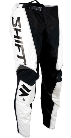 Shift WHIT3 Label Trac MX pants in white and black, featuring a sleek design with adjustable waist and durable fabric.