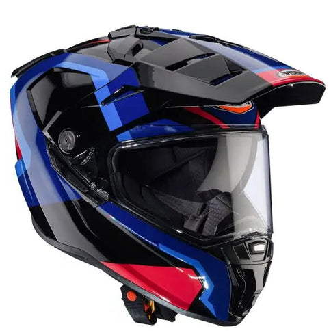 Caberg Tanami Scram adventure helmet in black, red, and blue with light blue accents, featuring a 3/4 view and aerodynamic design.