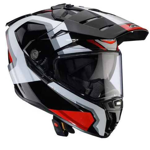 Caberg Tanami Scram adventure helmet in white, black, and red with a 3/4 design, featuring a secure strap and aerodynamic shape.