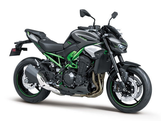 Kawasaki Z900 ABS naked motorcycle in black with sleek design and sporty features, front view showing headlight and handlebar.