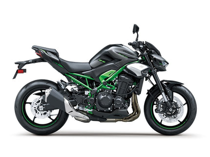 Kawasaki Z900 ABS naked motorcycle in black with sleek design and modern features, shown in a front-side view.