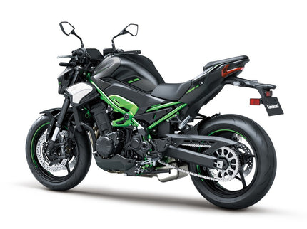 Kawasaki Z900 ABS naked motorcycle from 2026, sleek black design, with sporty stance and modern headlights.