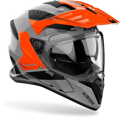 AIROH Bandit Tune orange gloss adventure helmet with sleek design and secure strap, featuring vibrant orange glossy finish.