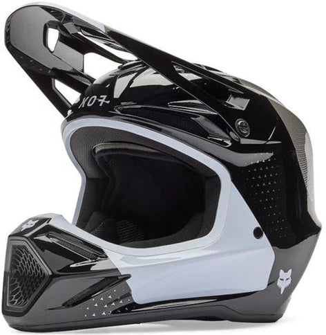 Black FOX V3 Tine MX helmet with ventilation and adjustable straps, designed for motocross riders.