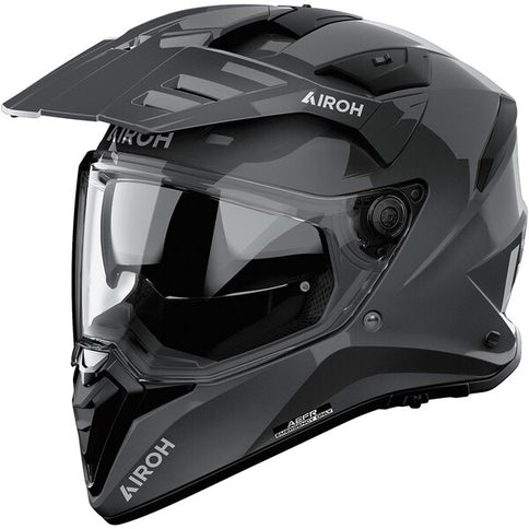 AIROH Bandit adventure helmet in dark grey with full-face design, featuring a sleek and protective helmet for motorcycle riding.