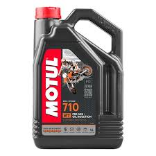 Motul 710 2T 4L two-stroke engine oil bottle with label and cap, designed for motorcycle and small engine lubrication.
