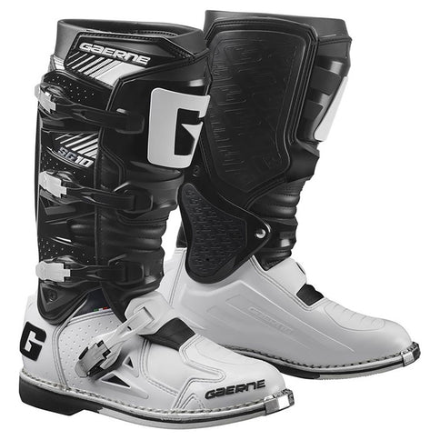 Black and white Gaerne SG10 MX boots with reinforced ankle support and sturdy construction for motocross riding.