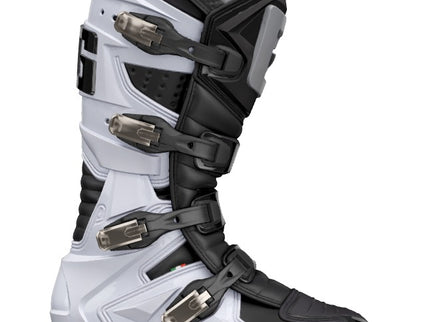 GAERNE GX1 MX boots in black and white with sturdy construction and secure fastening, designed for motocross riding.