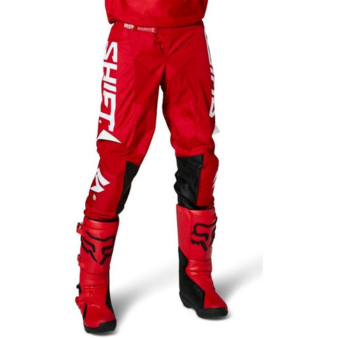Red SHIFT WHIT3 Label MX Trac Pants with black accents, designed for motocross riding and featuring durable, flexible material.