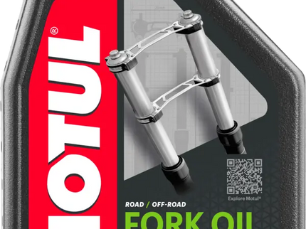 Motul Fork Oil 10W 1L bottle, high-quality motorcycle suspension fork oil, durable and designed for smooth riding.