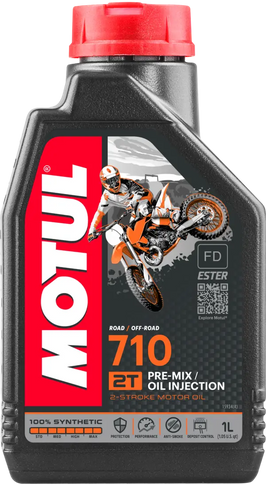 Motul 710 2T 1Lt bottle of high-quality 2-stroke engine oil from MOTUL, with label and cap visible.