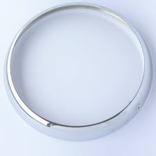 Yamaha RX100 headlight rim, motorcycle parts with chrome finish, visible mounting edges and design details for Yamaha RX100 bike