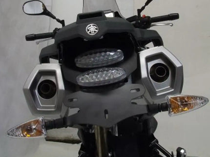 R&G Tail Tidy XT660Z motorcycle accessory installed on a blue Yamaha XT660Z, showcasing sleek, streamlined rear end modification.