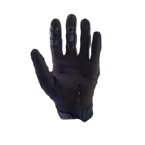 FOX Bomber MX gloves with black and red design, featuring padded knuckles and adjustable wrist straps for motocross riding.