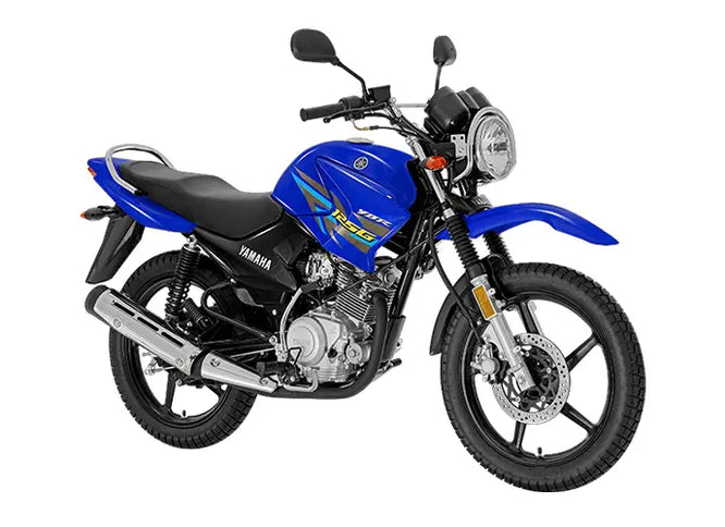 Yamaha YBR 125 G motorcycle parked on city street, black and silver body with sporty design and comfortable seat.