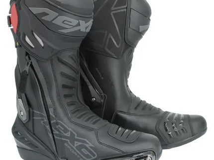 NEXO Swift MX motorcycle boots in black with reinforced ankle protection and sturdy sole, designed for motocross riding.