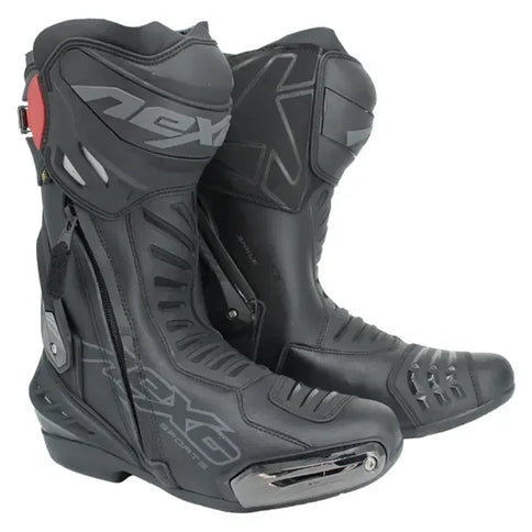 NEXO Swift MX motorcycle boots in black with reinforced ankle protection and sturdy sole, designed for motocross riding.