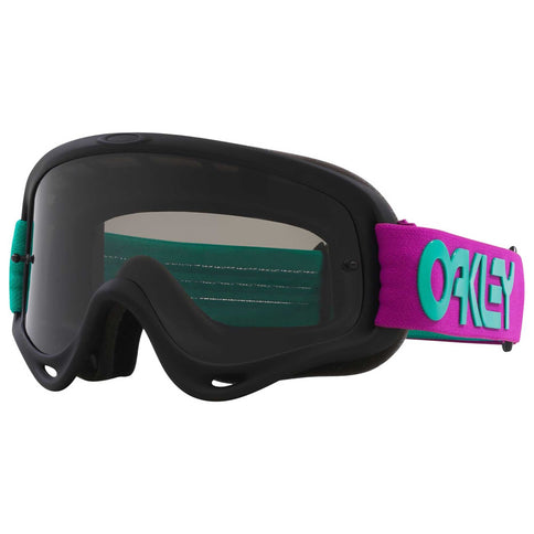 Oakley O-Frame MX goggles with Celeste blue frame and dark grey lens for motocross racing.